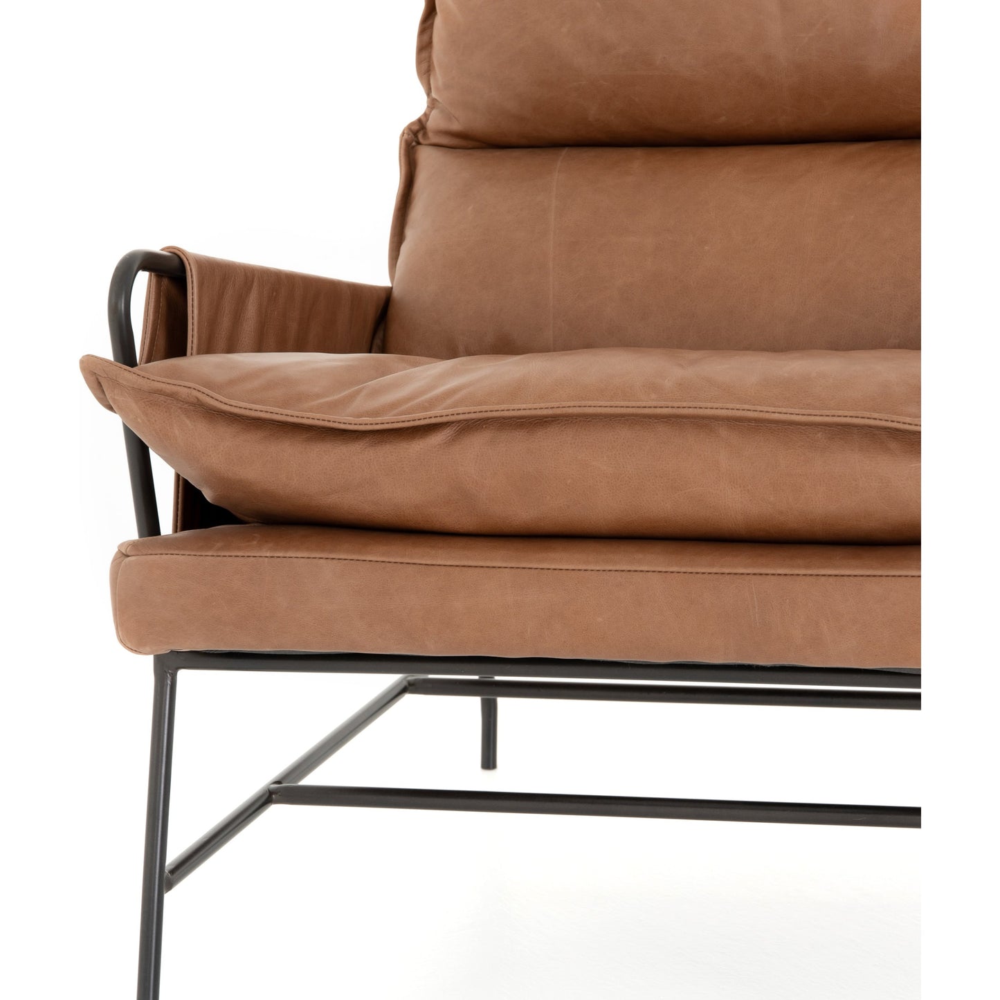 045 SR-810048 | Closeup | Taryn Chair by Four Hands. Made from top grain leather, iron, 100% polyester in a modern style.