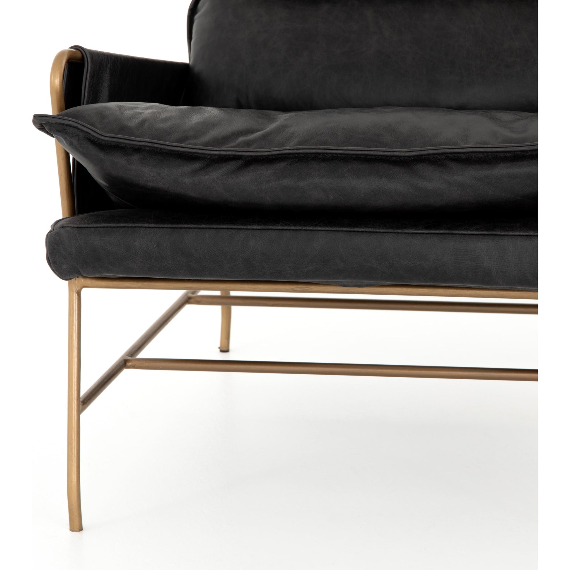 Taryn Chair by Four Hands. Made from top grain leather, iron, 100% polyester in a modern style.
