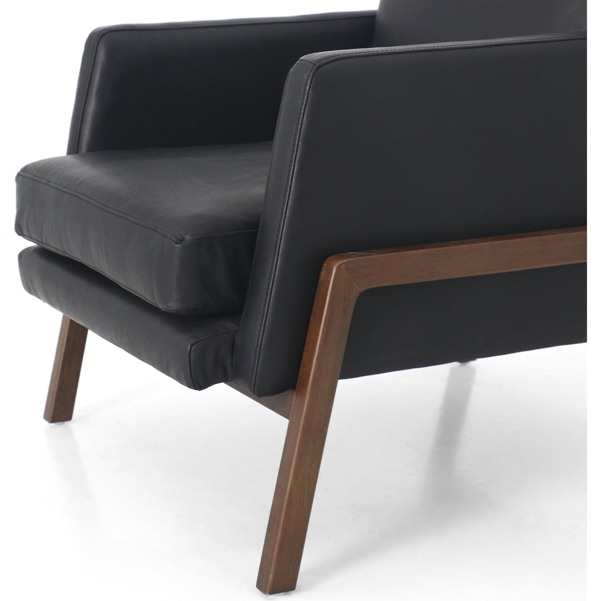 Diana Chair by Four Hands in sonoma butterscotch. Made from top grain leather, solid parawood, 100% polyester in a modern style.