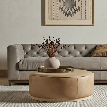 Sinclair Large Round Ottoman by Four Hands. Made from unique in a modern style.