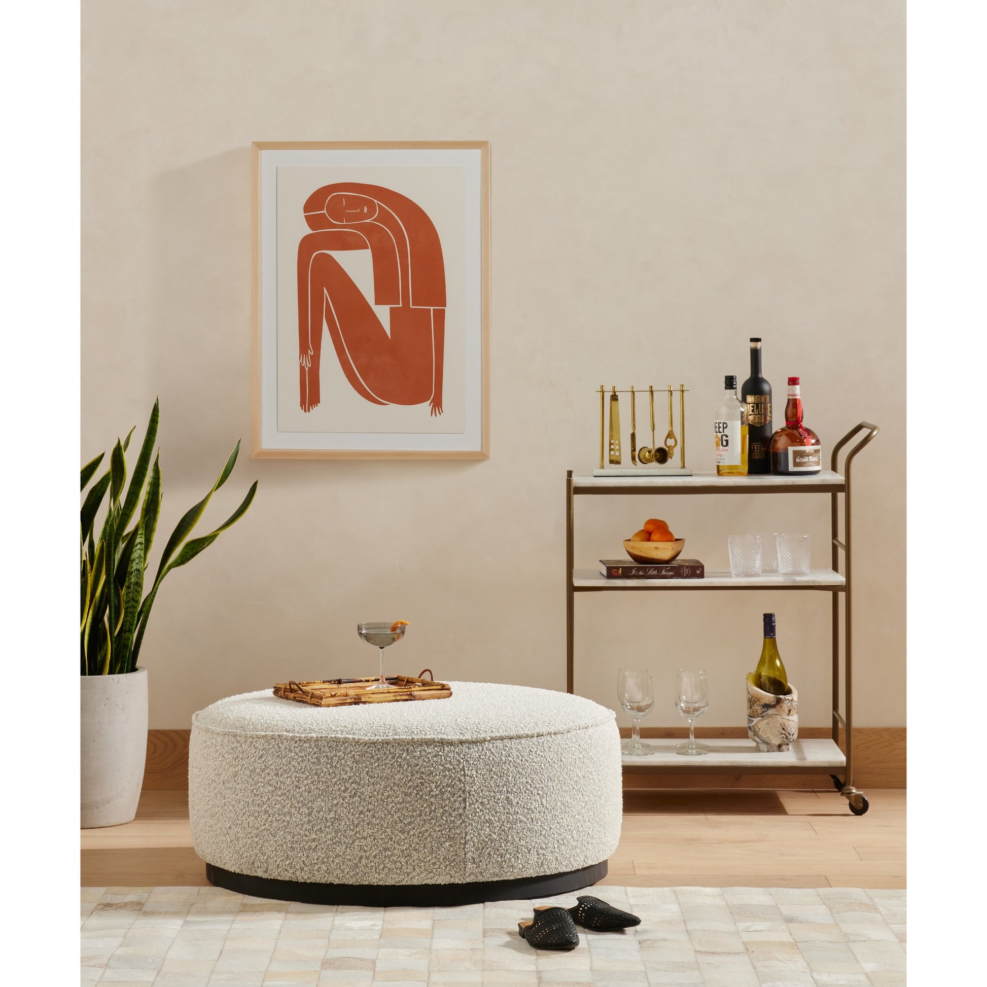 Sinclair Large Round Ottoman by Four Hands. Made from unique in a modern style.