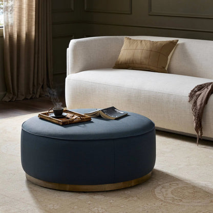 Sinclair Large Round Ottoman by Four Hands. Made from unique in a modern style.
