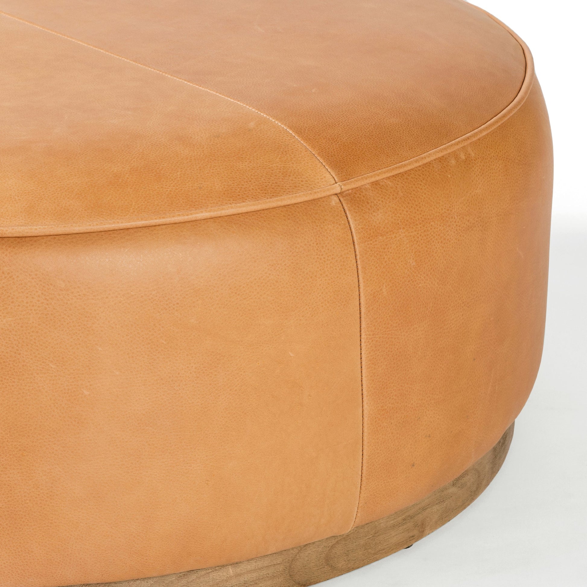 Sinclair Large Round Ottoman by Four Hands. Made from unique in a modern style.