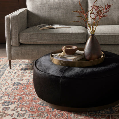Sinclair Large Round Ottoman by Four Hands. Made from unique in a modern style.