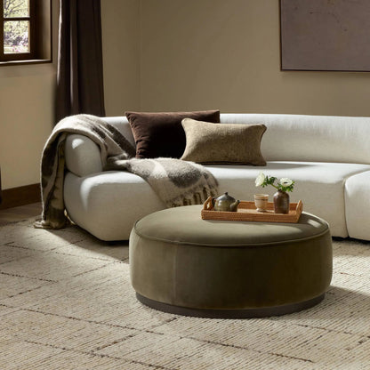 Sinclair Large Round Ottoman by Four Hands. Made from unique in a modern style.