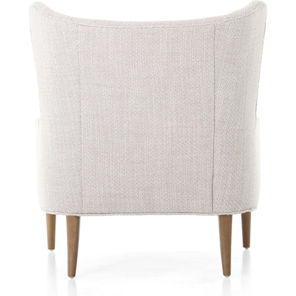 Marlow Wing Chair by Four Hands. Made from top grain leather, solid parawood, 100% polyester in a modern style.