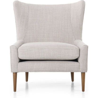 Marlow Wing Chair by Four Hands. Made from top grain leather, solid parawood, 100% polyester in a modern style.