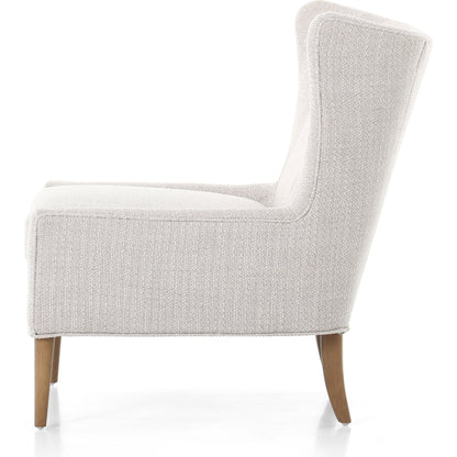 Marlow Wing Chair by Four Hands. Made from top grain leather, solid parawood, 100% polyester in a modern style.