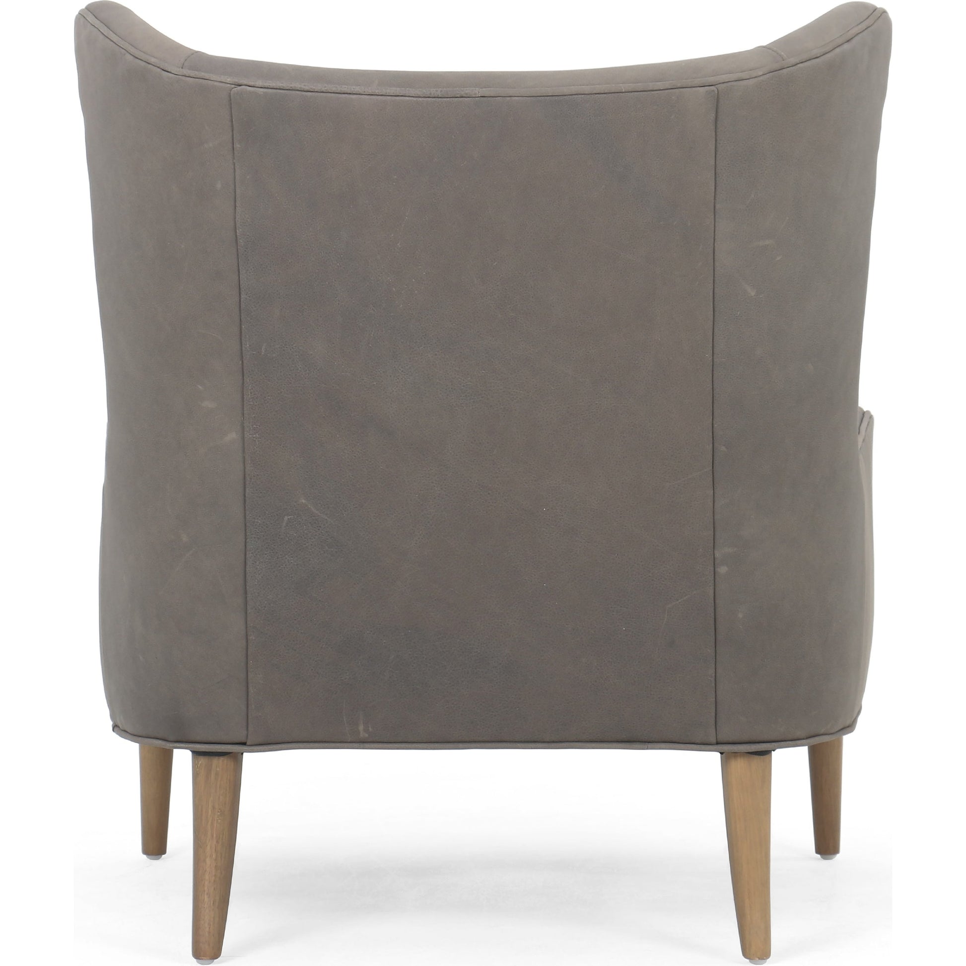 Marlow Wing Chair by Four Hands. Made from top grain leather, solid parawood, 100% polyester in a modern style.
