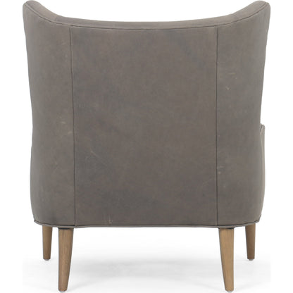 Marlow Wing Chair by Four Hands. Made from top grain leather, solid parawood, 100% polyester in a modern style.