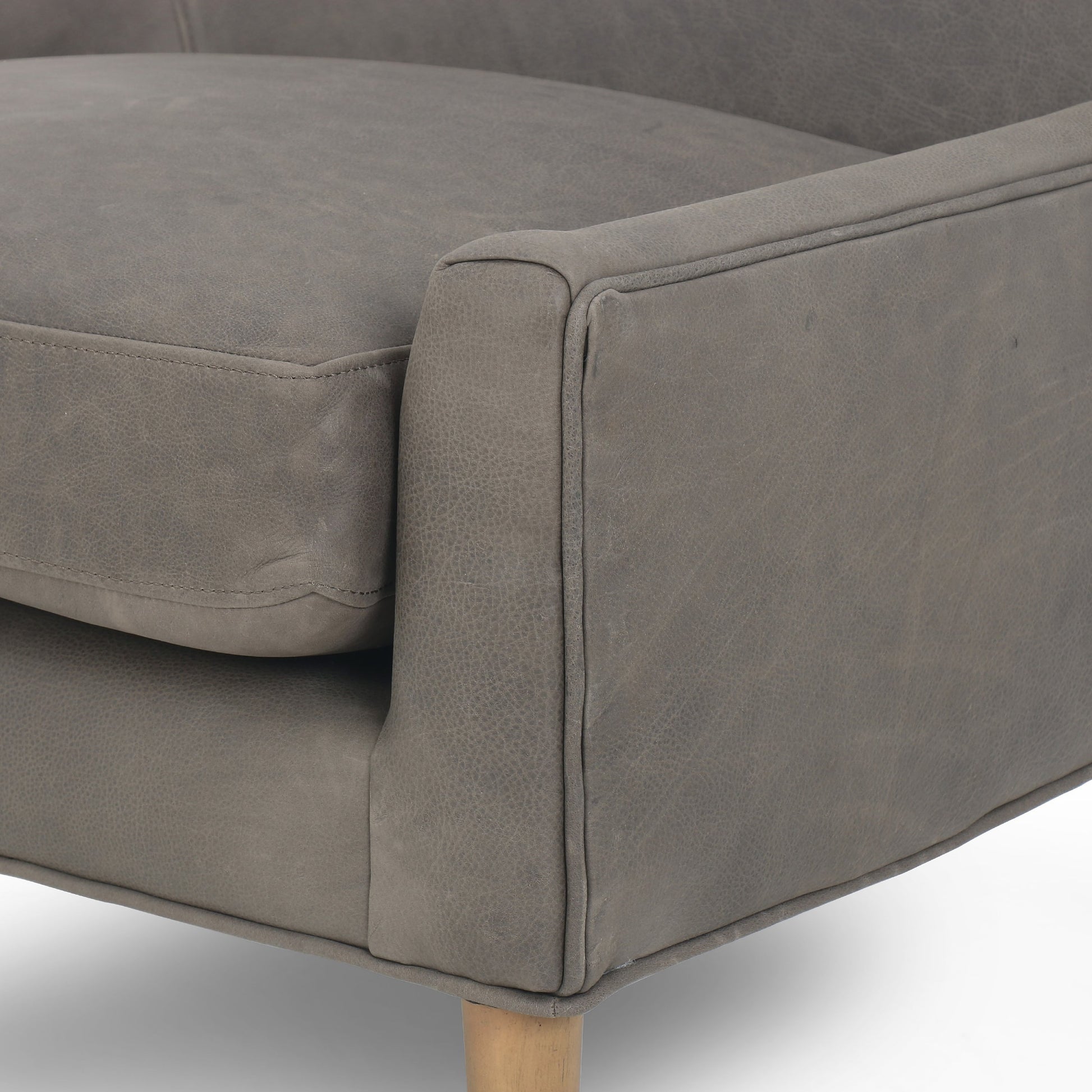 Marlow Wing Chair by Four Hands. Made from top grain leather, solid parawood, 100% polyester in a modern style.