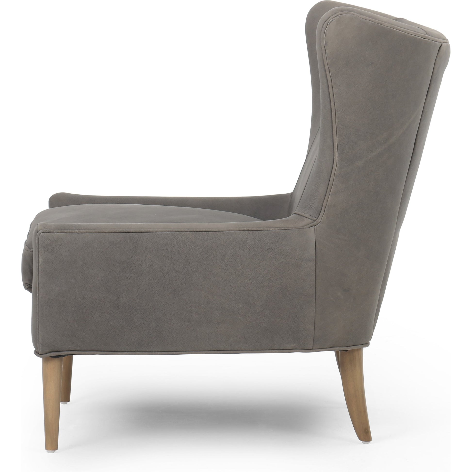 Marlow Wing Chair by Four Hands. Made from top grain leather, solid parawood, 100% polyester in a modern style.