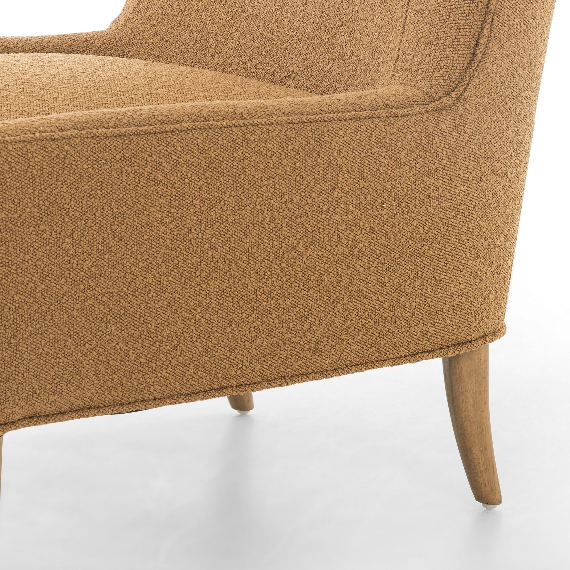 Marlow Wing Chair by Four Hands. Made from top grain leather, solid parawood, 100% polyester in a modern style.