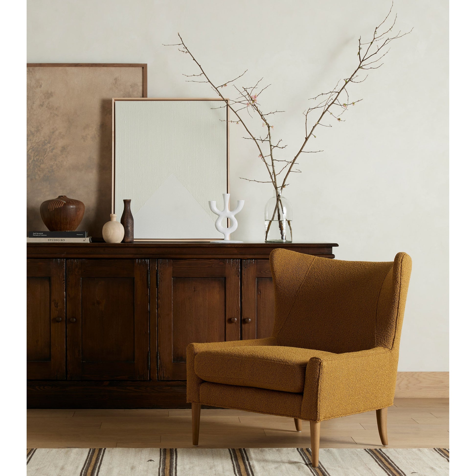 Marlow Wing Chair by Four Hands. Made from top grain leather, solid parawood, 100% polyester in a modern style.