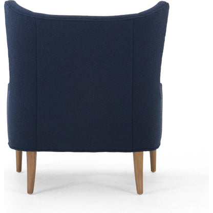 Marlow Wing Chair by Four Hands. Made from top grain leather, solid parawood, 100% polyester in a modern style.