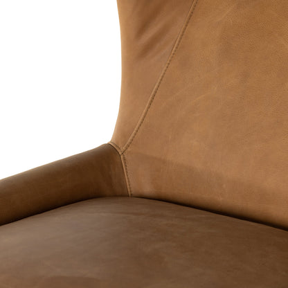 Marlow Wing Chair by Four Hands. Made from top grain leather, solid parawood, 100% polyester in a modern style.