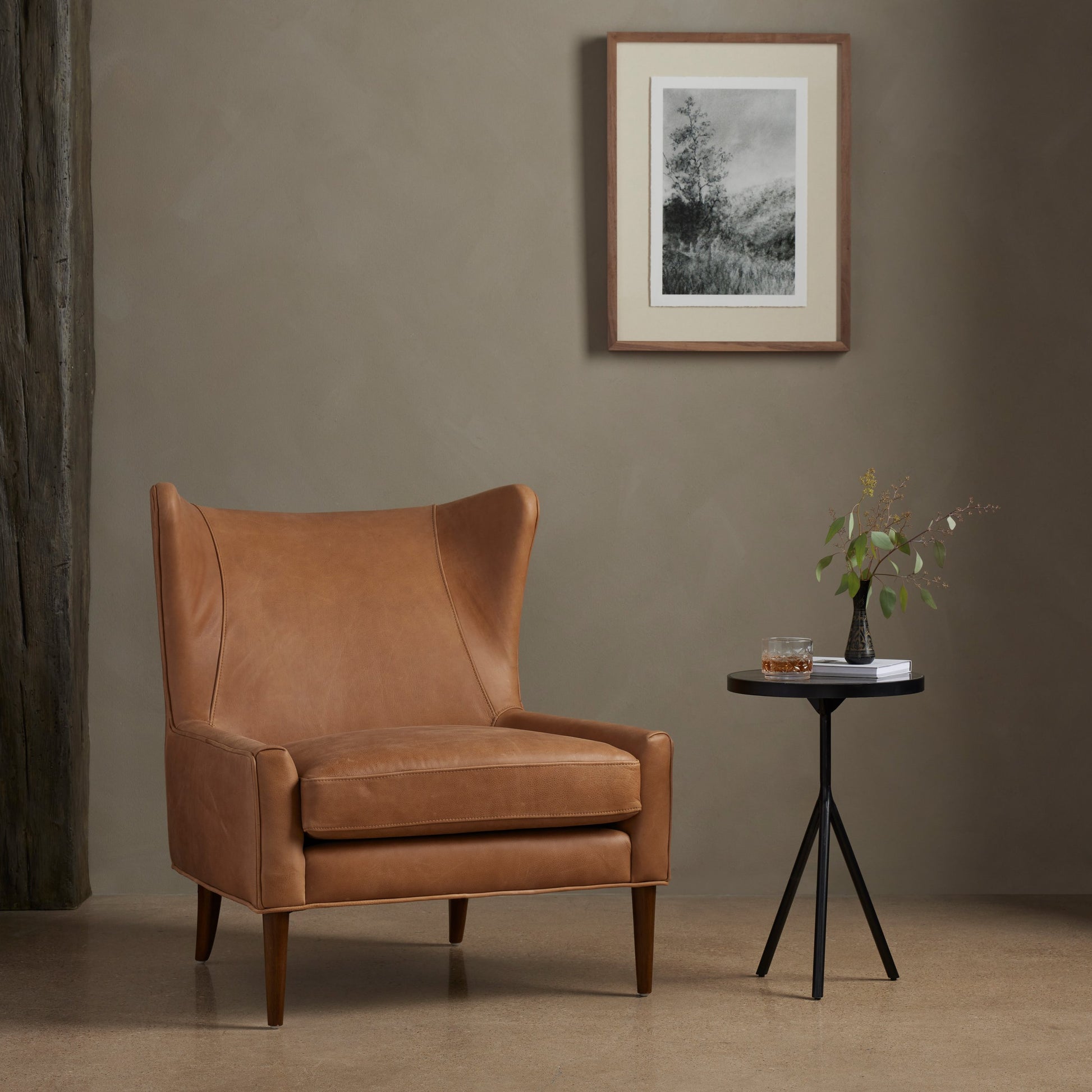 Marlow Wing Chair by Four Hands. Made from top grain leather, solid parawood, 100% polyester in a modern style.
