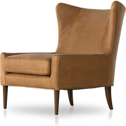 Marlow Wing Chair by Four Hands. Made from top grain leather, solid parawood, 100% polyester in a modern style.
