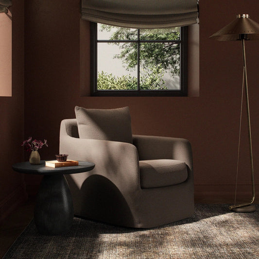 Banks Slipcover Swivel Chair by Four Hands in savoy coffee. Made from 61% polyester, 31% viscose (rayon), 8% flax, linen in a transitional style.