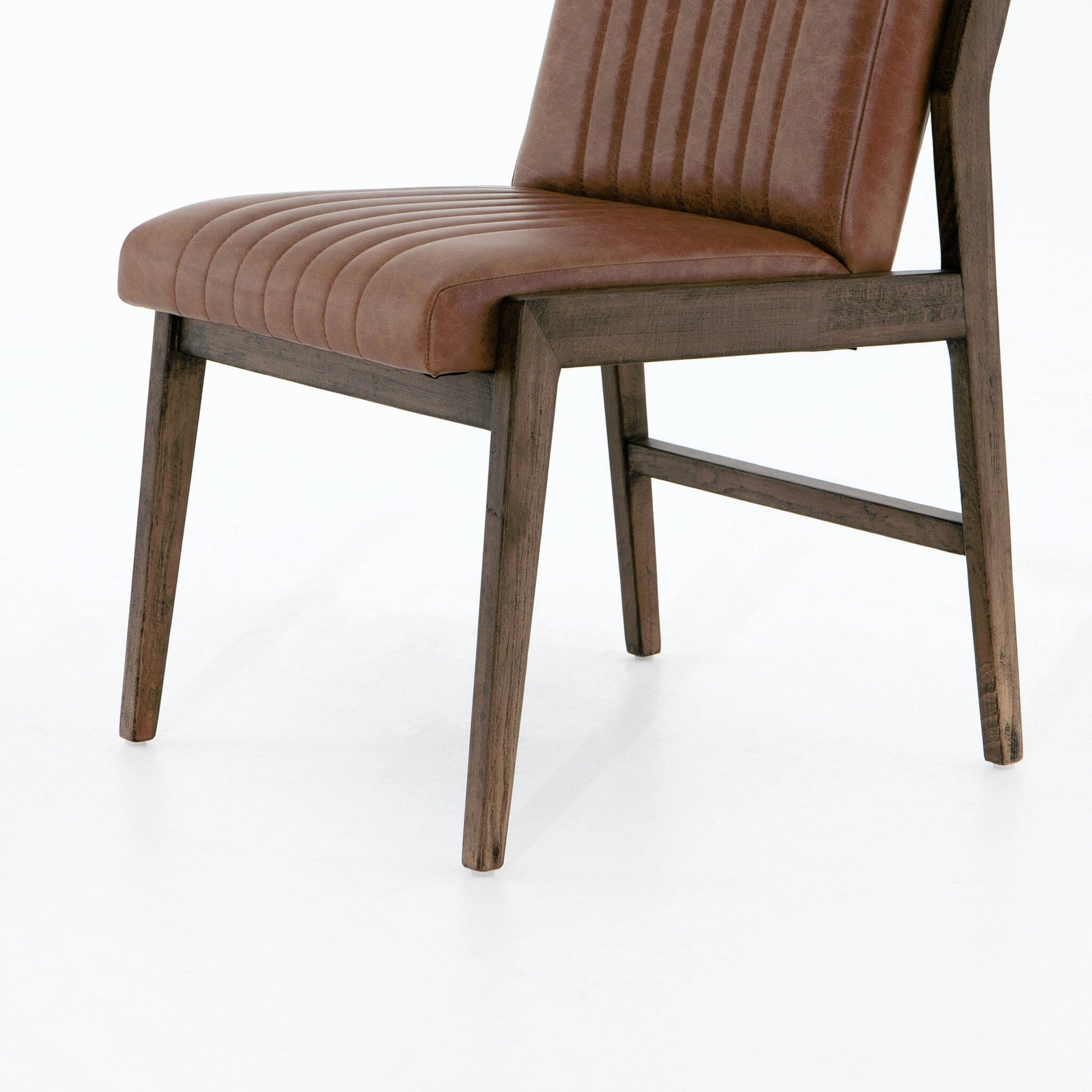 Alice Dining Chair by Four Hands. Made from top grain leather, solid beech in a modern style.