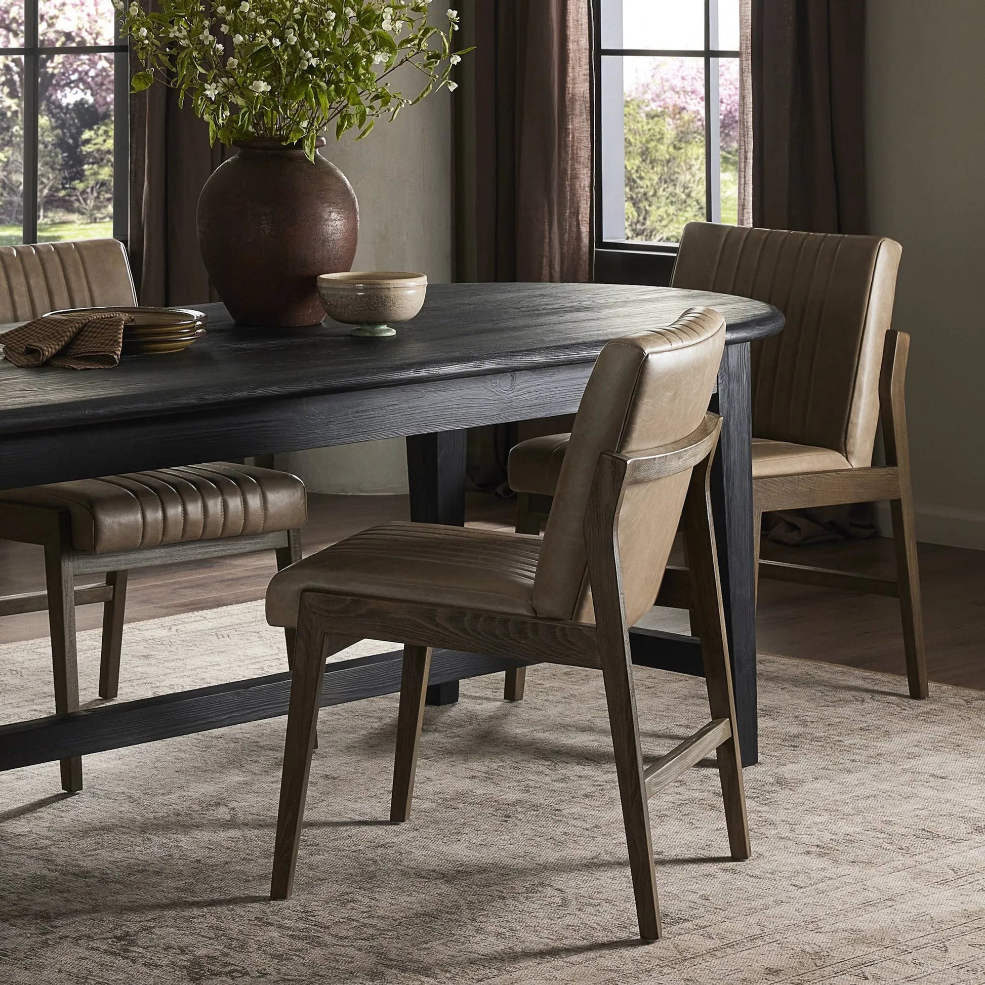 Alice Dining Chair by Four Hands. Made from top grain leather, solid beech in a modern style.