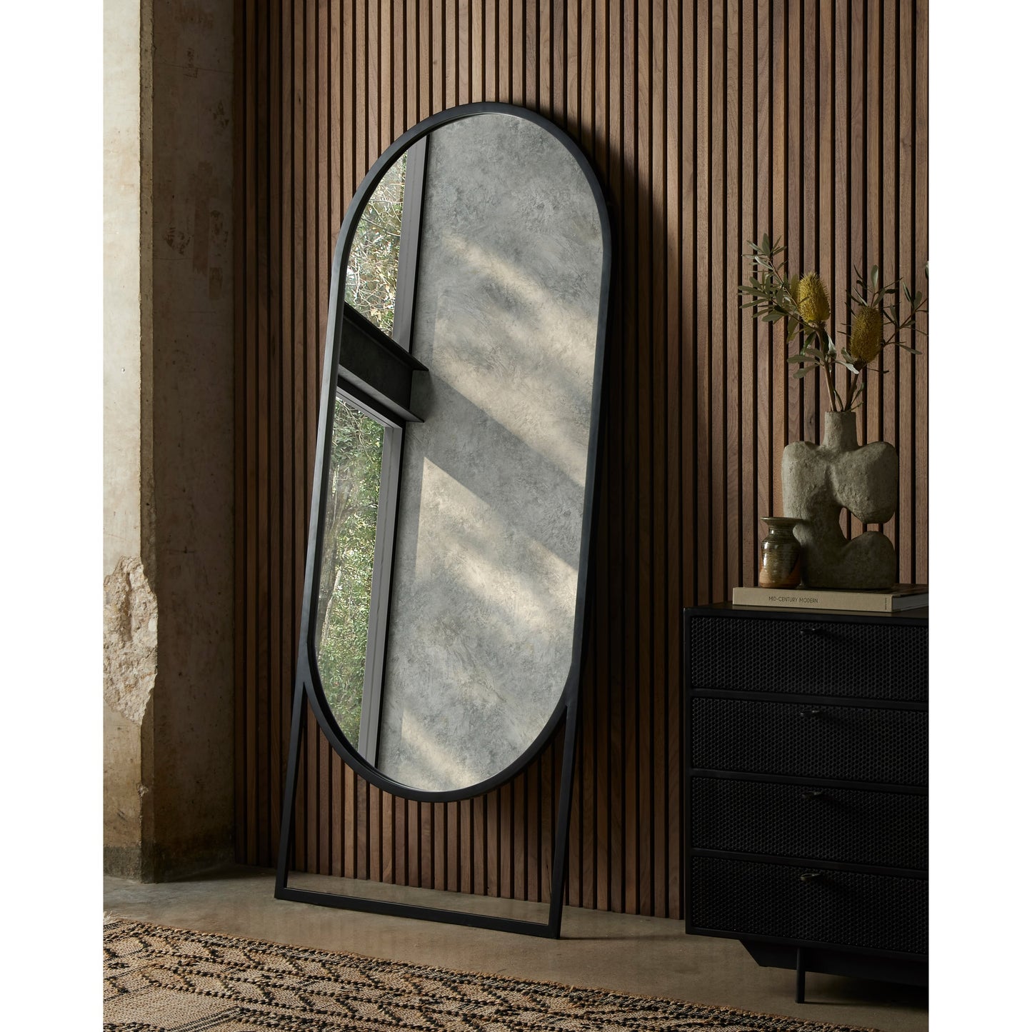 023 SI-1797829 | Lifestyle | Dawson Floor Mirror by Four Hands in matte black. Made from iron, mirror in a modern style.