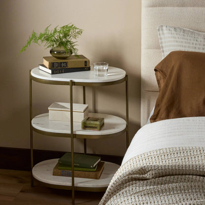 Felix Oval Nightstand by Four Hands in antique brass, polished white marble. Made from iron, solid marble in a modern style.