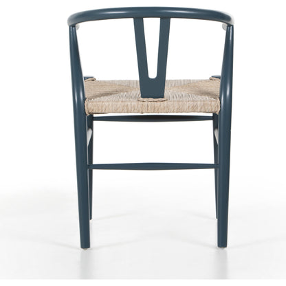 Muestra Dining Chair by Four Hands. Made from solid teak, 100% polyethylene in a coastal style.