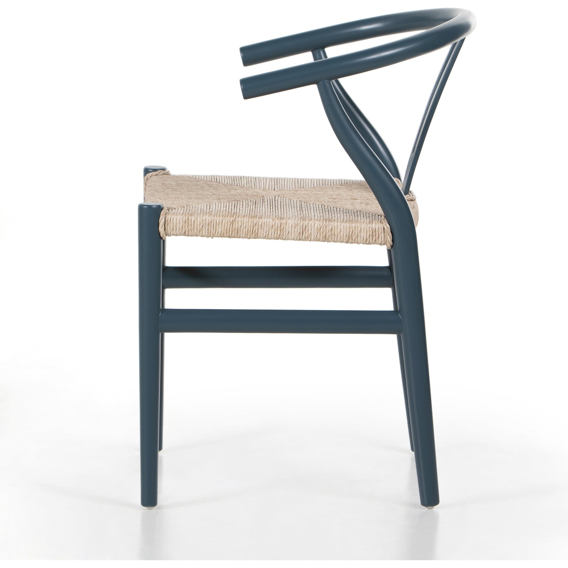 Muestra Dining Chair by Four Hands. Made from solid teak, 100% polyethylene in a coastal style.