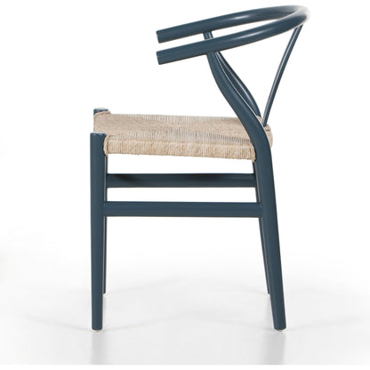Muestra Dining Chair by Four Hands. Made from solid teak, 100% polyethylene in a coastal style.