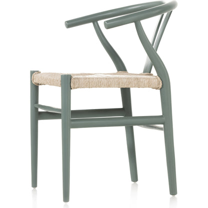 Muestra Dining Chair by Four Hands. Made from solid teak, 100% polyethylene in a coastal style.