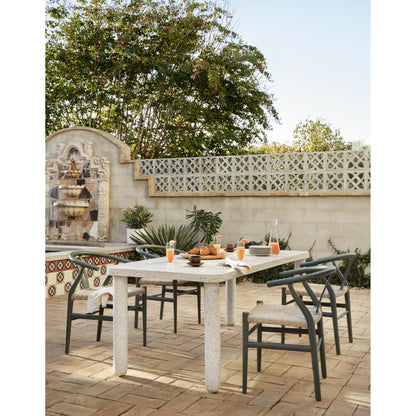 Muestra Dining Chair by Four Hands. Made from solid teak, 100% polyethylene in a coastal style.