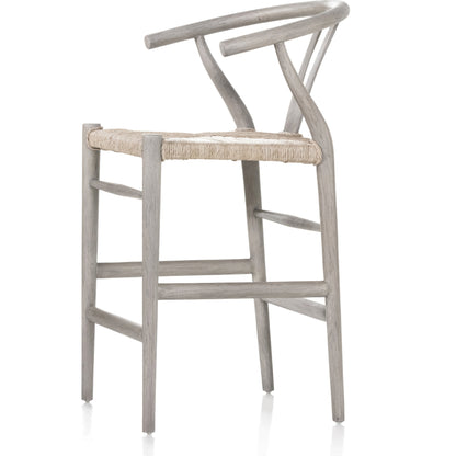 Muestra Counter Stool by Four Hands in vintage white, black teak. Made from solid teak, 100% polyethylene in a coastal style.