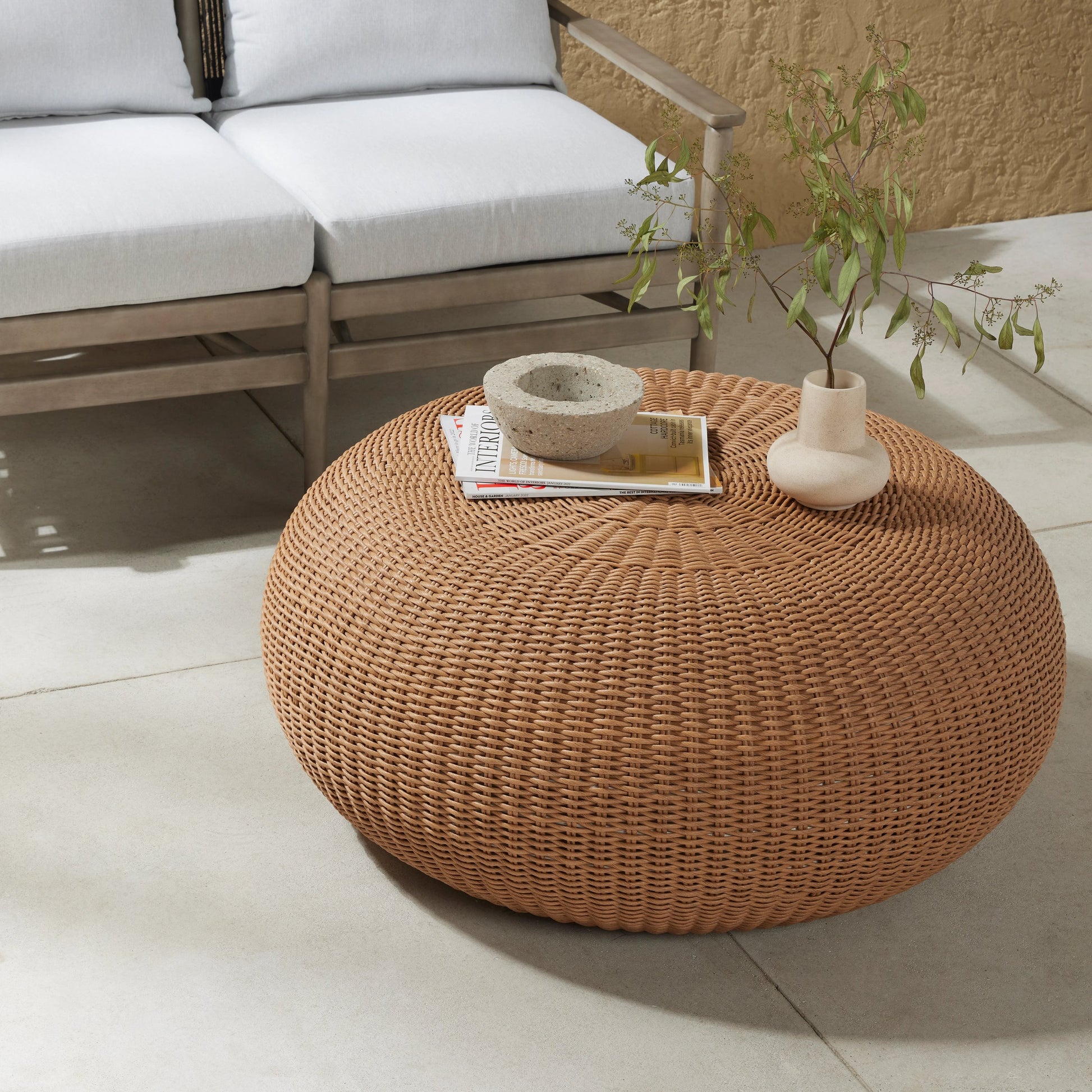 Phoenix Outdoor Coffee Table by Four Hands in vintage white. Made from 100% polyethylene, aluminum in a cottage & farmhouse style.