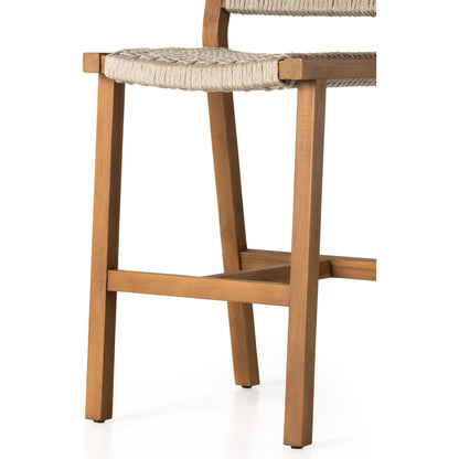 Delano Outdoor Bar Stool by Four Hands. Made from solid fsc®-certified teak, 100% polypropylene in a coastal style.