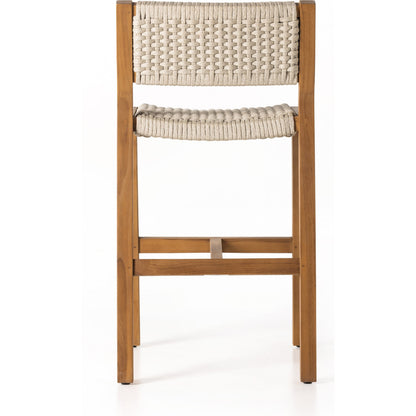 Delano Outdoor Counter Stool by Four Hands. Made from solid fsc®-certified teak, 100% polypropylene in a coastal style.