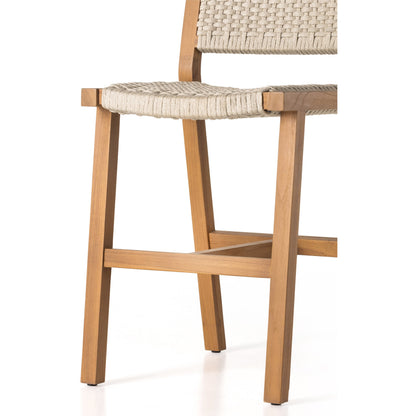 Delano Outdoor Counter Stool by Four Hands. Made from solid fsc®-certified teak, 100% polypropylene in a coastal style.