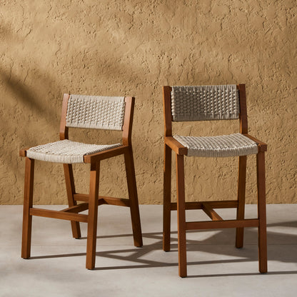 Delano Outdoor Counter Stool by Four Hands. Made from solid fsc®-certified teak, 100% polypropylene in a coastal style.