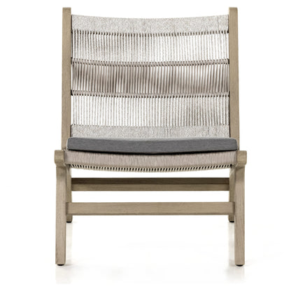 Julian Outdoor Chair by Four Hands. Made from 100% olefin, solid fsc®-certified teak, 100% polypropylene in a modern style.