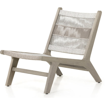 Julian Outdoor Chair by Four Hands. Made from 100% olefin, solid fsc®-certified teak, 100% polypropylene in a modern style.