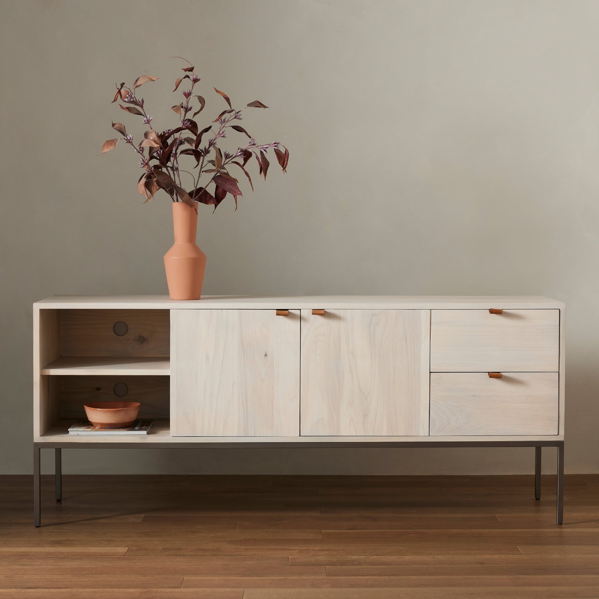 Trey Media Console by Four Hands. Made from solid poplar, top grain leather, iron in a modern style.