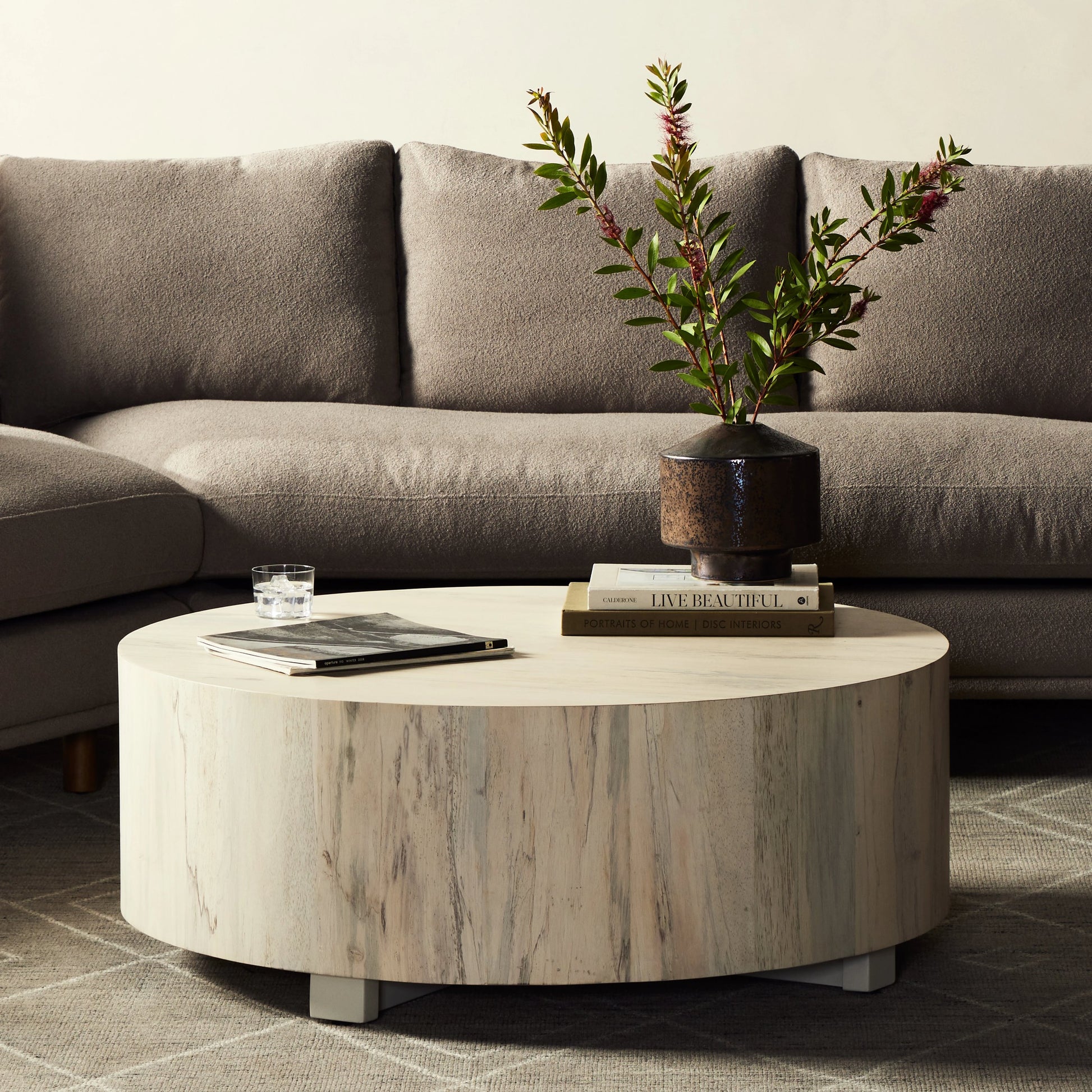 Hudson Round Coffee Table by Four Hands. Made from unique in a cottage & farmhouse style.