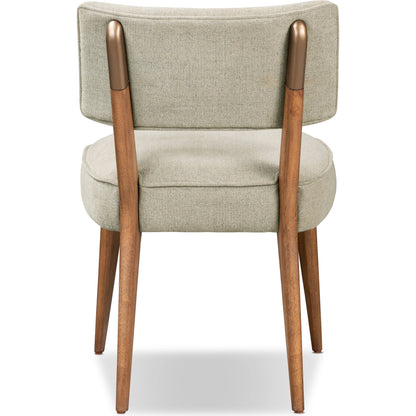 Orville Dining Chair by Four Hands in cambric ivory. Made from 90% polyester, 10% flax, linen, solid parawood, iron in a modern style.