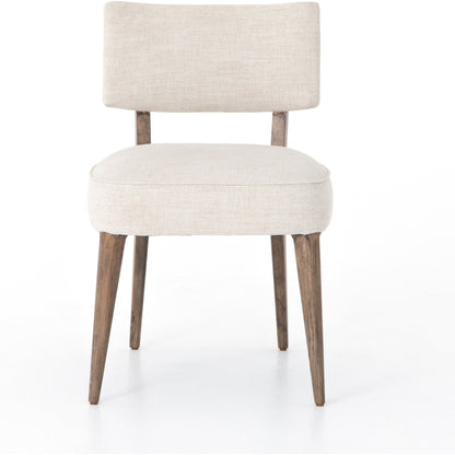Orville Dining Chair by Four Hands in cambric ivory. Made from 90% polyester, 10% flax, linen, solid parawood, iron in a modern style.