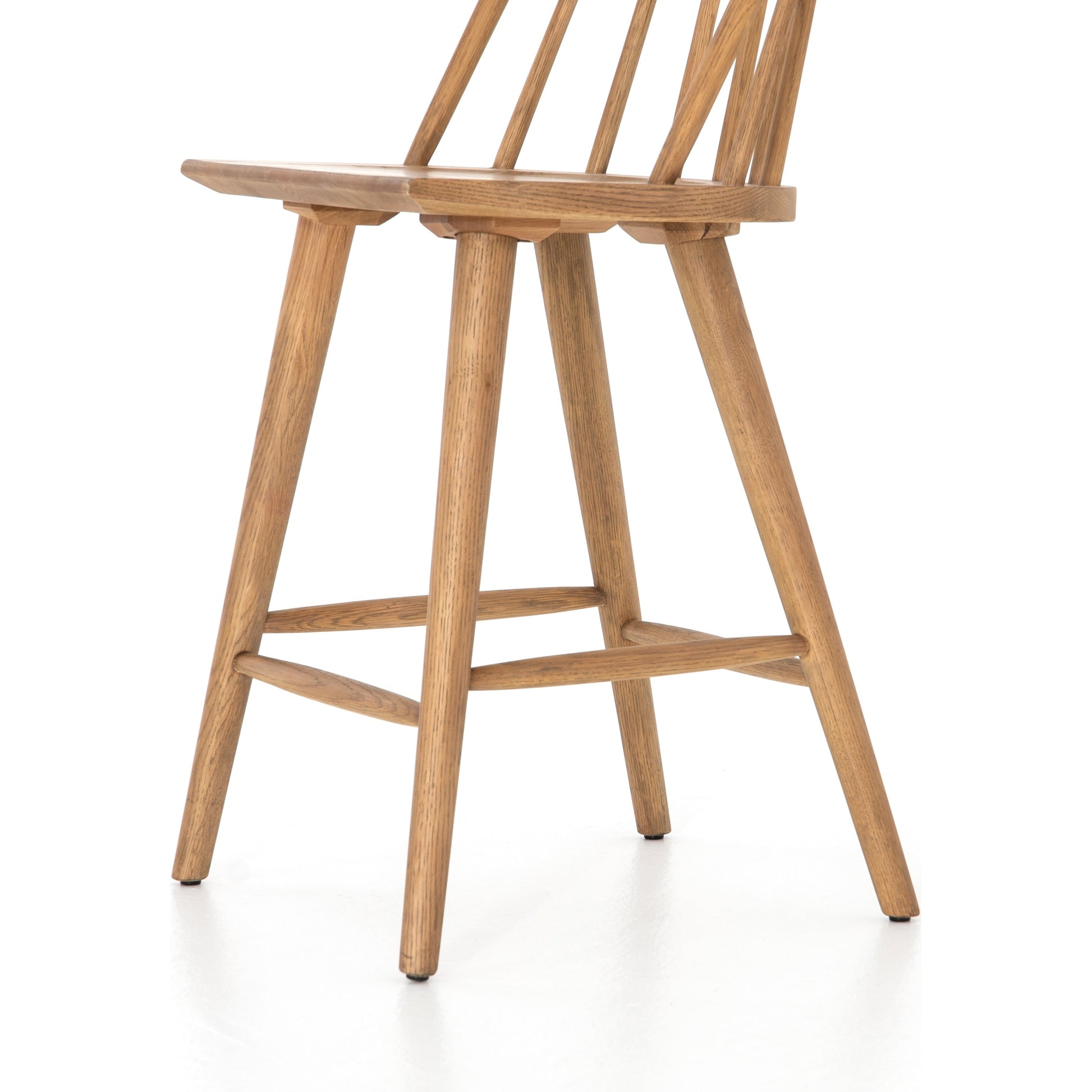 Lewis Windsor Counter Stool by Four Hands. Made from unique in a transitional style.