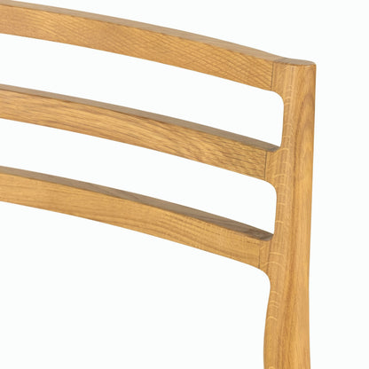 Glenmore Dining Chair by Four Hands. Made from 49% viscose (rayon), 22% flax, linen, 18% polyester, 11% cotton, solid oak, 100% polyester in a transitional style.