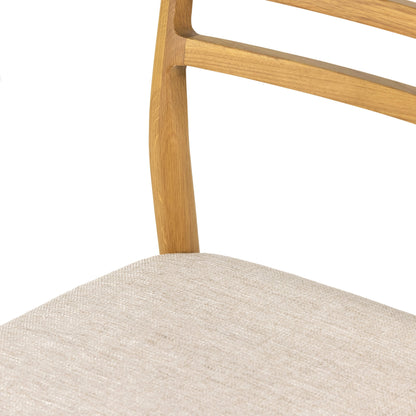Glenmore Dining Chair by Four Hands. Made from 49% viscose (rayon), 22% flax, linen, 18% polyester, 11% cotton, solid oak, 100% polyester in a transitional style.