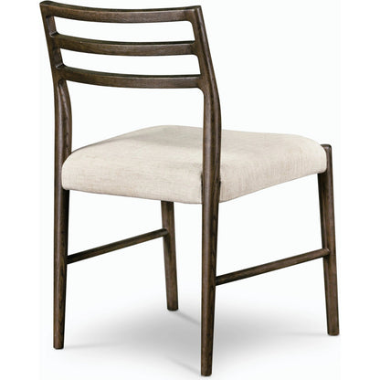 Glenmore Dining Chair by Four Hands. Made from 49% viscose (rayon), 22% flax, linen, 18% polyester, 11% cotton, solid oak, 100% polyester in a transitional style.
