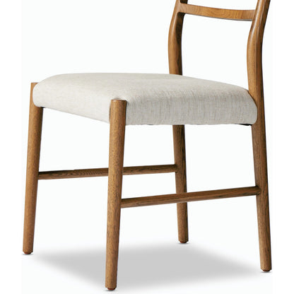 Glenmore Dining Chair by Four Hands. Made from 49% viscose (rayon), 22% flax, linen, 18% polyester, 11% cotton, solid oak, 100% polyester in a transitional style.