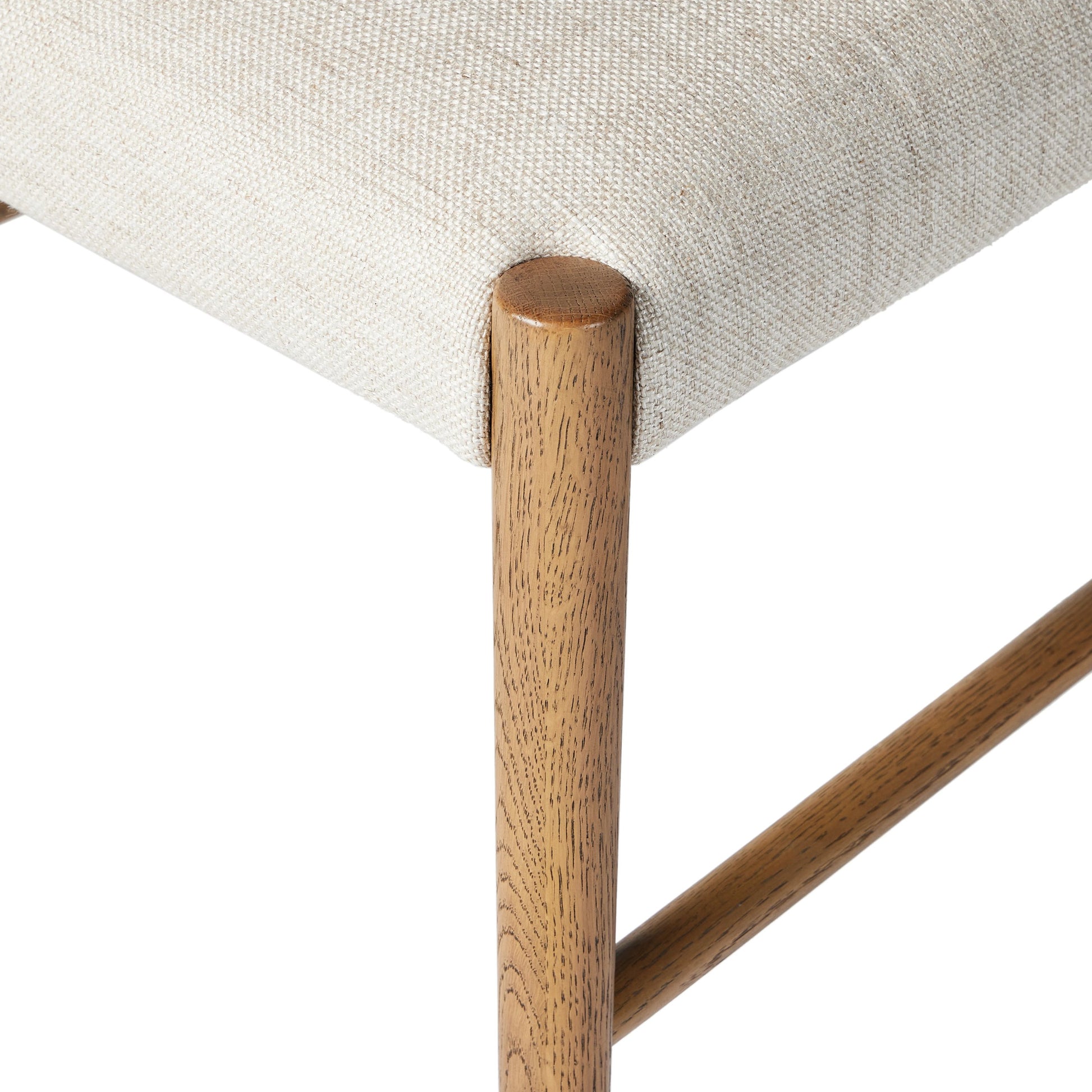Glenmore Dining Chair by Four Hands. Made from 49% viscose (rayon), 22% flax, linen, 18% polyester, 11% cotton, solid oak, 100% polyester in a transitional style.